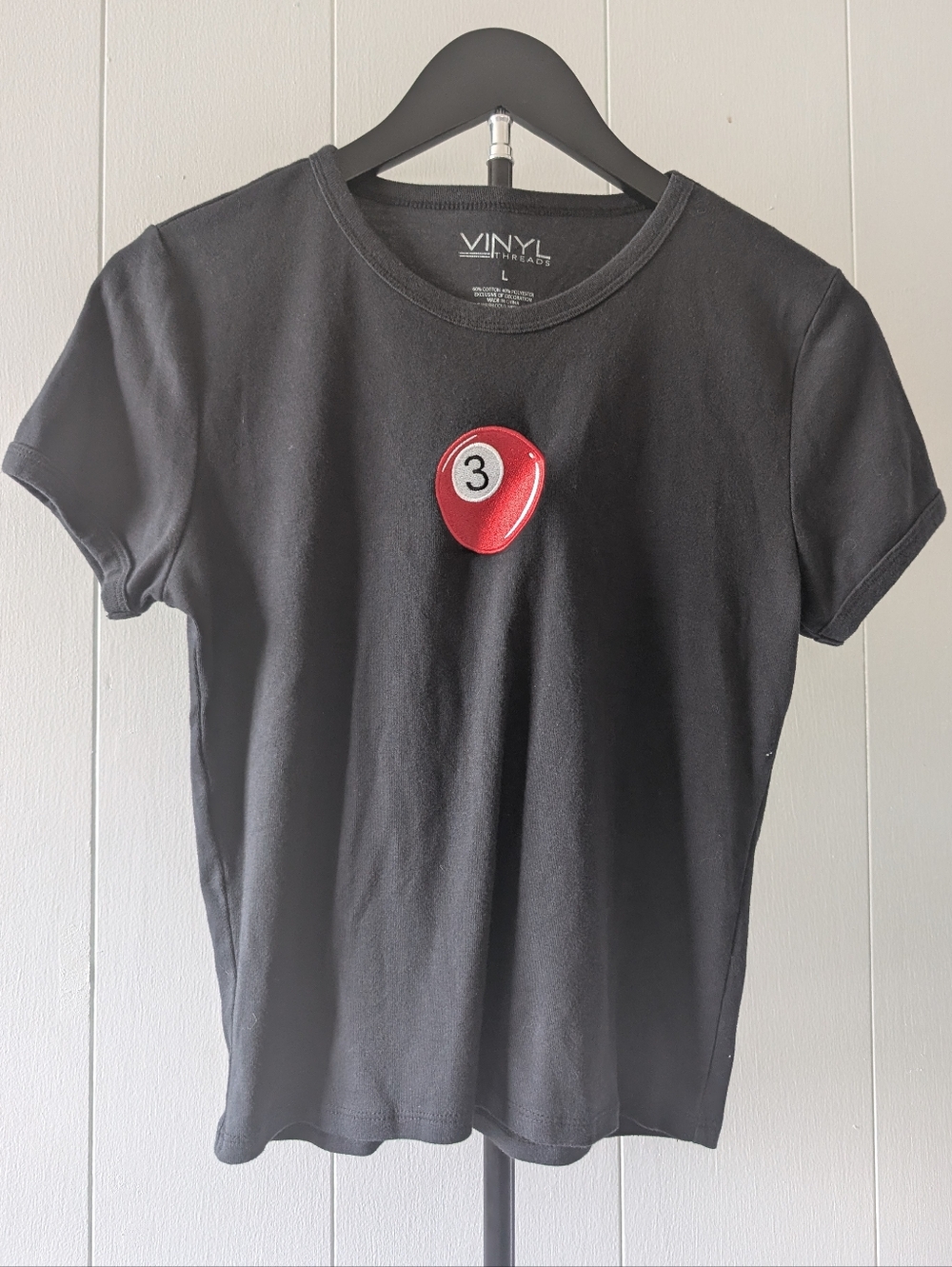 Cropped Black Graphic Tee with Red 3-Ball Detail